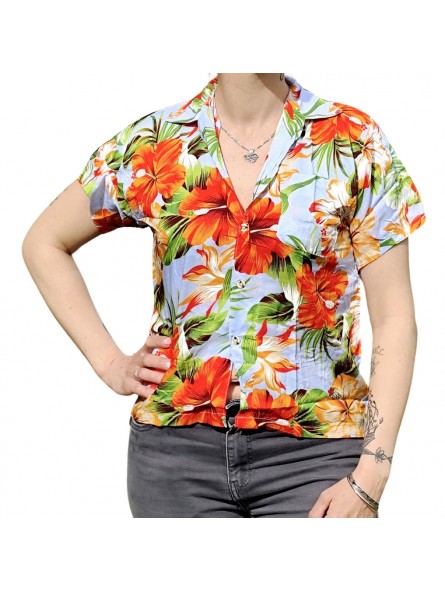 Chemisier bleu ciel aux fleurs tropicales