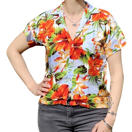Chemisier bleu ciel aux fleurs tropicales