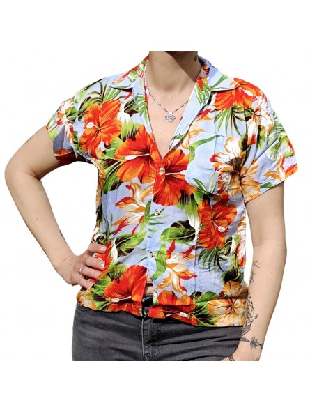Chemisier bleu ciel aux fleurs tropicales