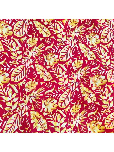 Tissu couleur rouge et or motifs feuillage tropical stylisé