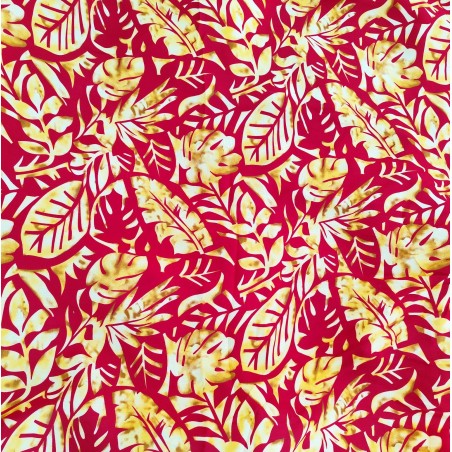 Tissu rouge et or feuillage tropical