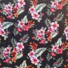 Tissu couleur noir motifs imprimés hibiscus et heliconia rouge