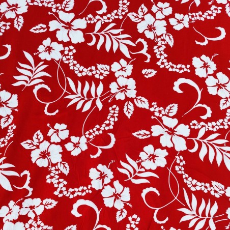 Tissu couleur rouge et or motifs feuillage tropical stylisé
