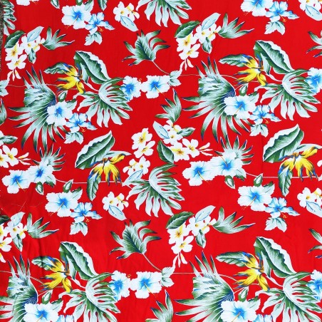 Tissu rouge vif avec motifs feuillage facon pochoir