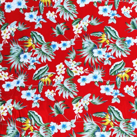 Tissu rouge vif avec motifs feuillage facon pochoir