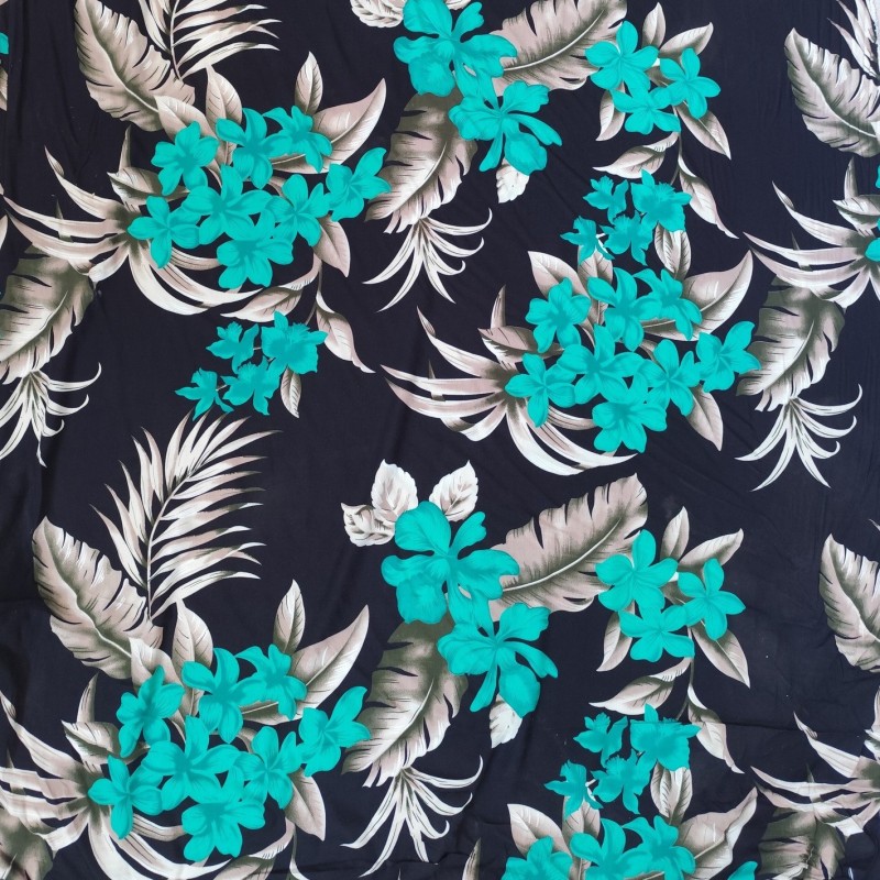 Tissi fleuri fond noir motifs fleurs de frangipane couleurs vert et argent