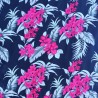 Tissi fleuri fond noir motifs fleurs de frangipane couleurs rose et argent