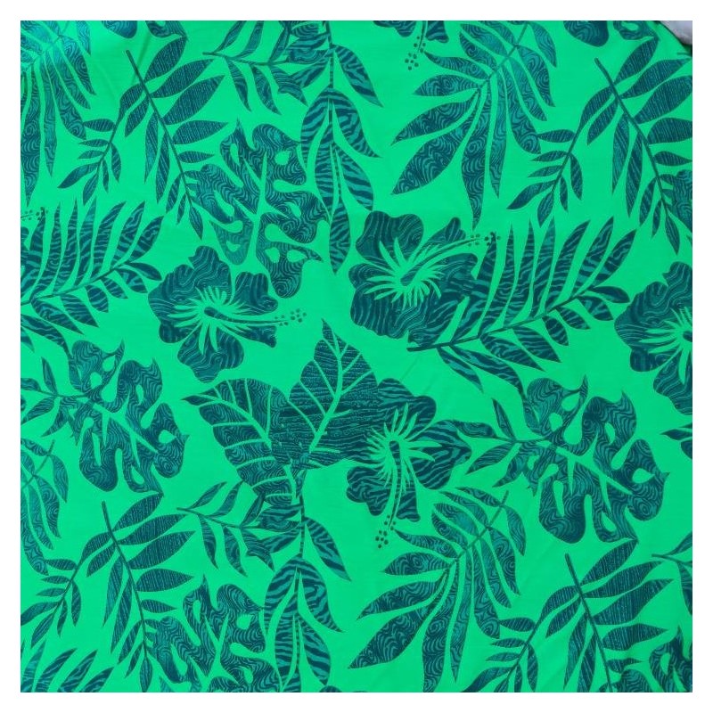 Tissu de couleur verte avec motifs hibiscus