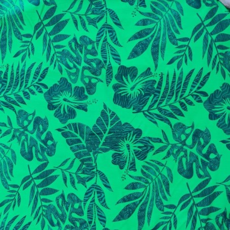 Tissu de couleur verte avec motifs hibiscus
