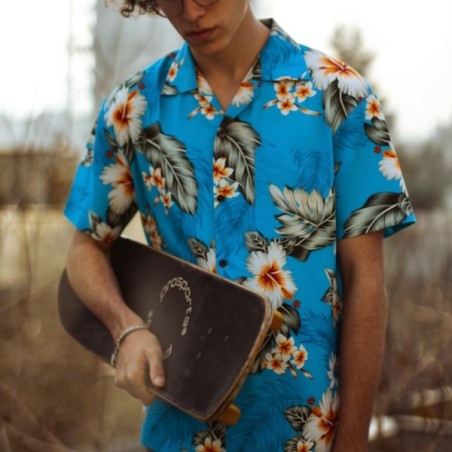 Chemisier hawaïen turquoise aux fleurs d'été