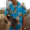 Chemisier hawaïen turquoise aux fleurs d'été