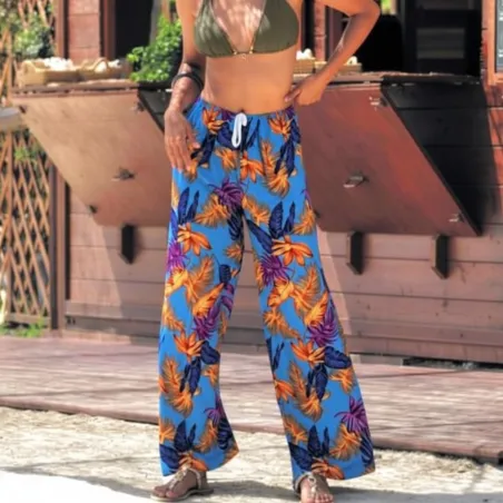 Pantalon de plage turquoise motifs feuillage