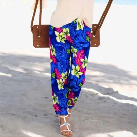Pantalon de plage bleu motif tatouage et frangipane