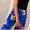 Pantalon de plage bleu motif tatouage et frangipane