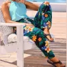 Pantalon de plage vert motif tatouage et frangipane