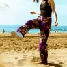 Pantalon de plage violet motif tatouage et frangipane