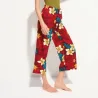 Pantalon de plage rouge motif tatouage et frangipane