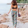 Pantalon de plage blanc aux motifs  fleurs oiseaux du paradis