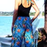 Pantalon de plage turquoise aux motifs  fleurs oiseaux du paradis