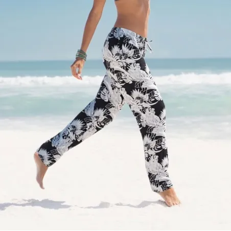 Pantalon de plage rouge aux motifs tropicaux