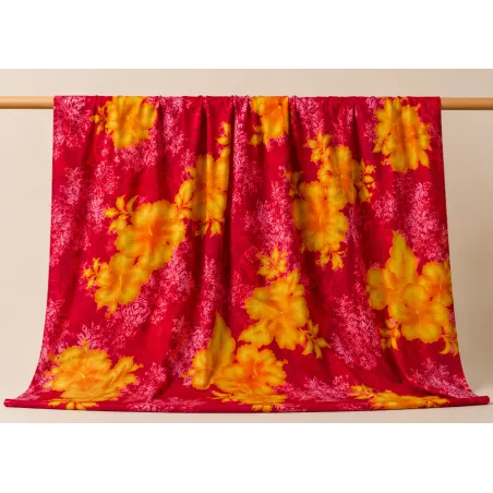 Tissu tropical rouge et jaune à fleurs hibiscus