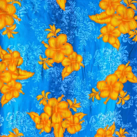 Tissu polynésien bleu à fleurs d’hibiscus jaunes
