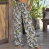 Tissu tropical gris-vert, blanc et jaune moutarde
