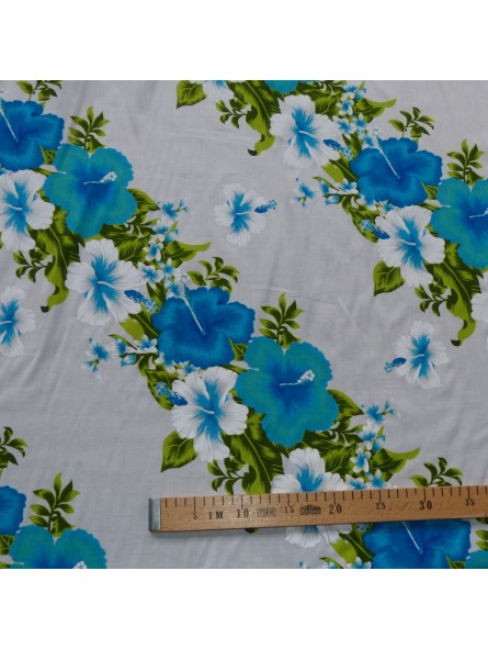 Tissu blanc et turquoise Hawaïen frise fleurie
